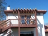 Upstairs deck using sustainably harvested log poles from North Fork Ca for shade