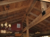 Douglas Fir Posts, Beams and Roof Decking, Jeffrey and Ponderosa Pine Joists and Beams, Western Hemlock Roof 2x6 T&G Roof Decking , Standing Dead Cedar and Pine Porch Posts.