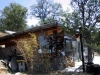 House of Mud, Stone and Reclaimed Timber